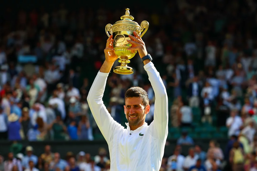 Do tennis players get to keep the trophy?